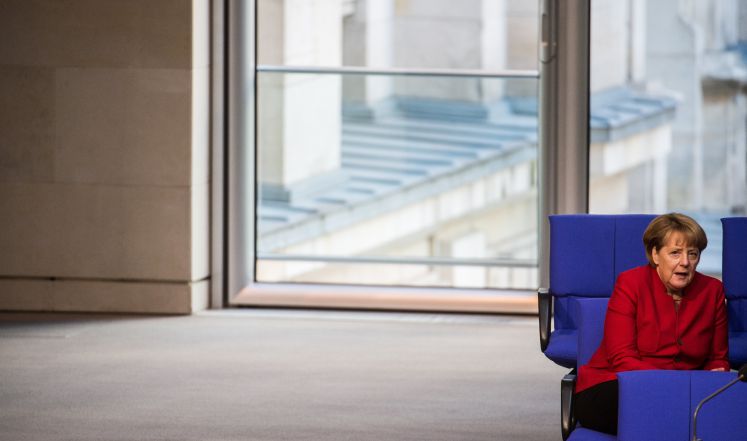 Bundeskanzlerin Angela Merkel (CDU) sitzt im Deutschen Bundestag in Berlin.