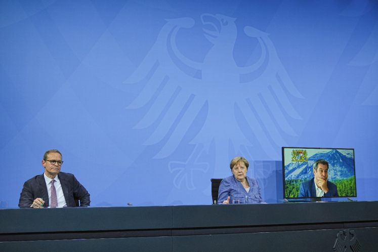 Michael Müller, Angela Merkel und Markus Söder