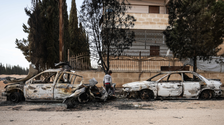 Ausgebrannte Autos in Ashrafiyat Sahnaya im Gouvernement Rif Dimashq