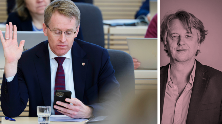 Daniel Günther am Handy