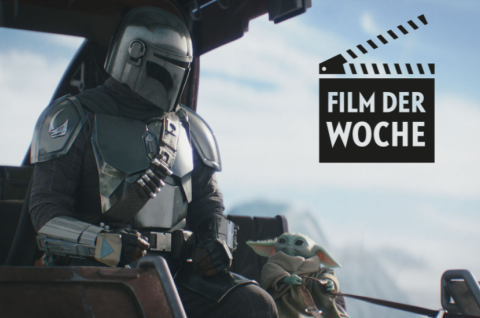 Grafik mit Mandalorianer und Grogu in einer Wüste, Logo mit Text „Film der Woche“ oben rechts.
